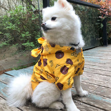 Load image into Gallery viewer, Sitting dog wearing Waterproof Dog Raincoat Yellow color Bear printing